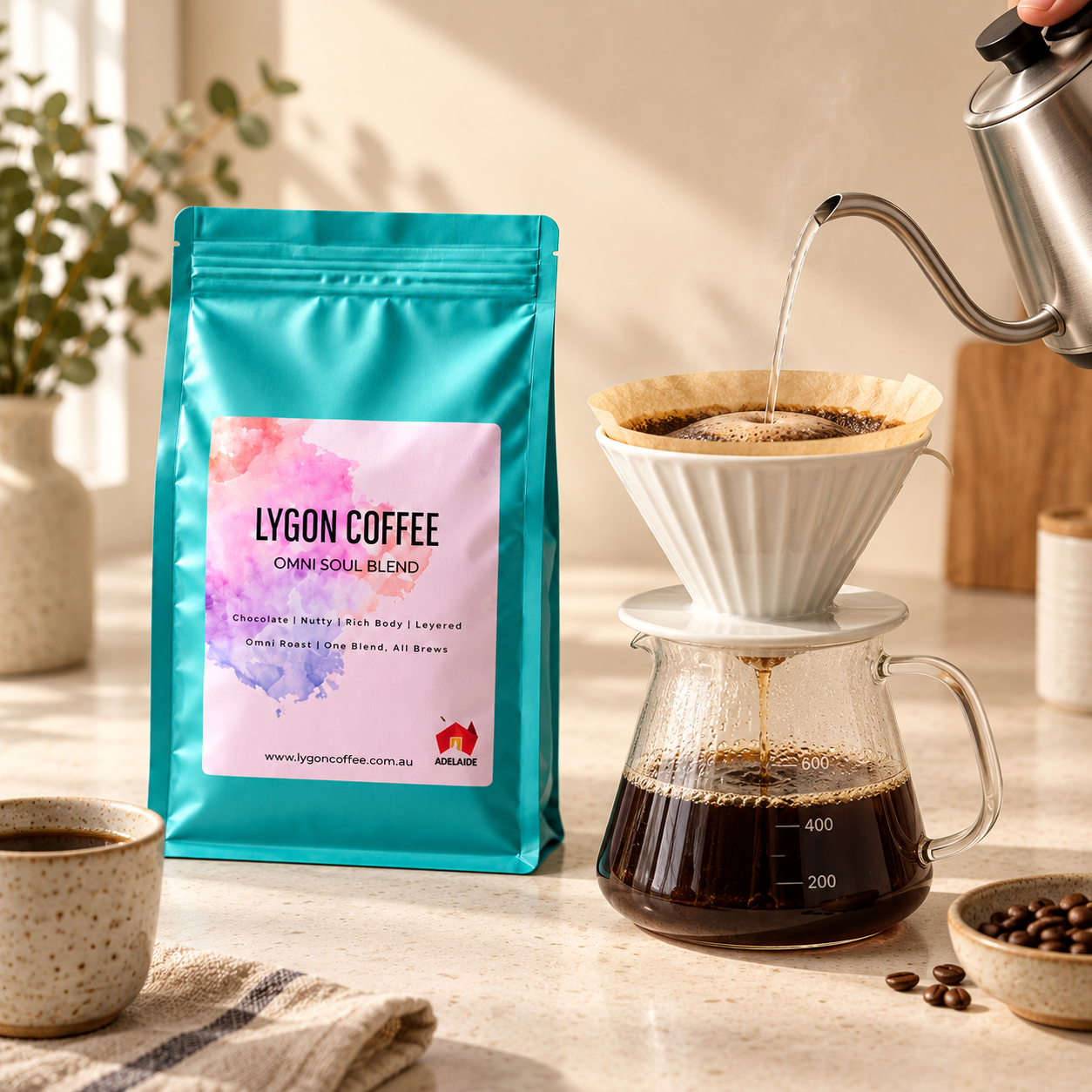 Pour-over brewer and OmniSoul Blend coffee bag