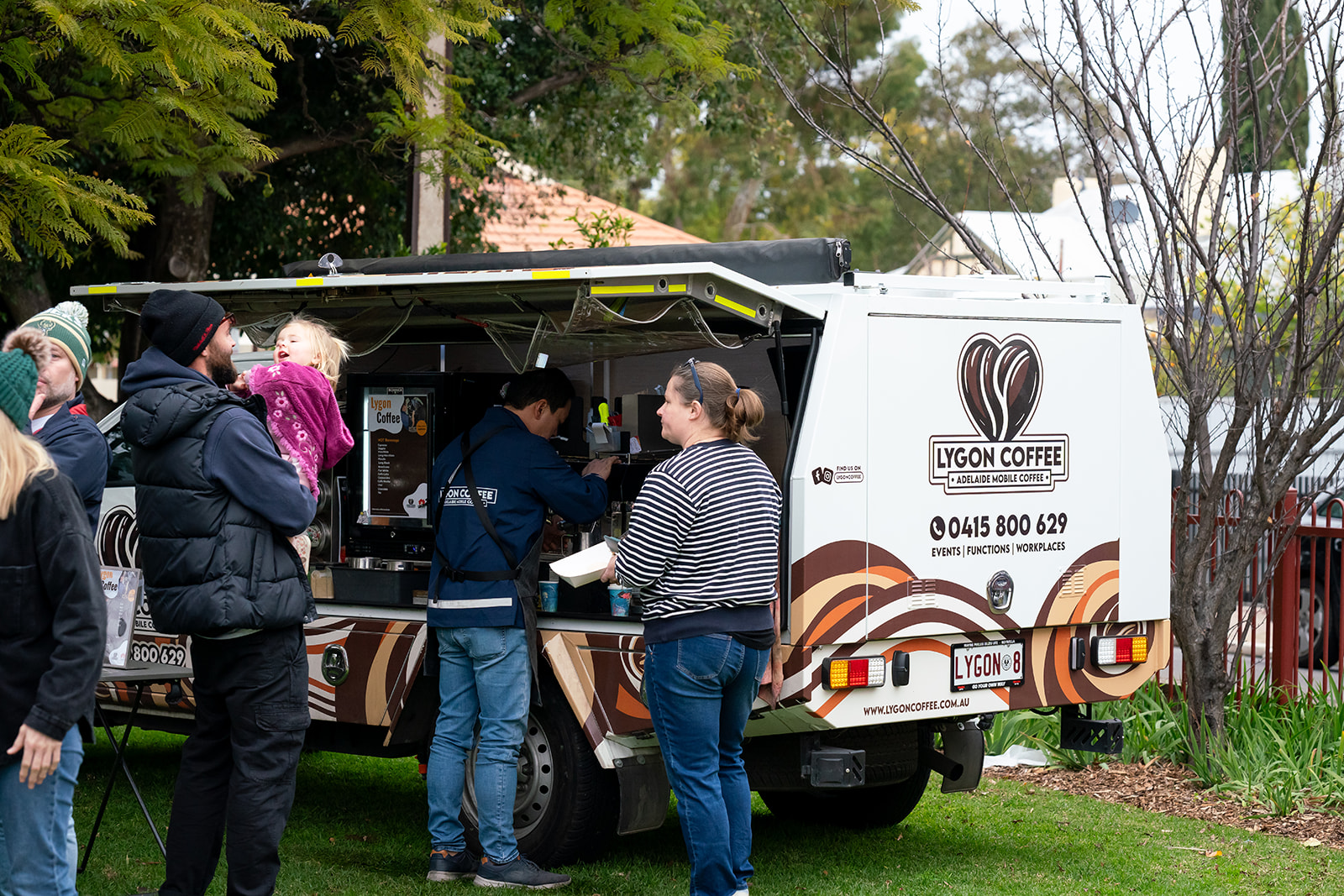 People queuing at the LygonCoffee van at a community event